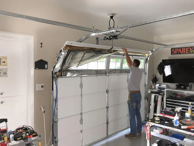Garage door section replacement by West Warwick Garage Door Repair in West Warwick