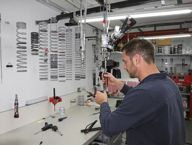 West Warwick Garage Door Repair safety certified technician performing precision spring replacement in West Warwick
